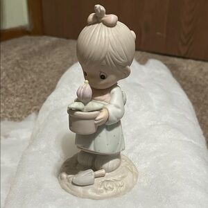 Adorable Figurine with Flower Pot